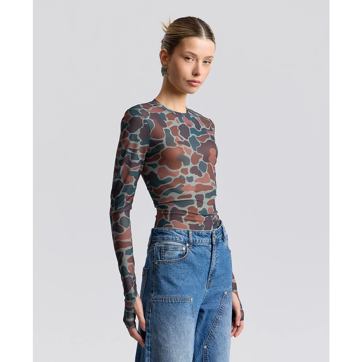 Blusa en Malla Estampada de Manga Larga