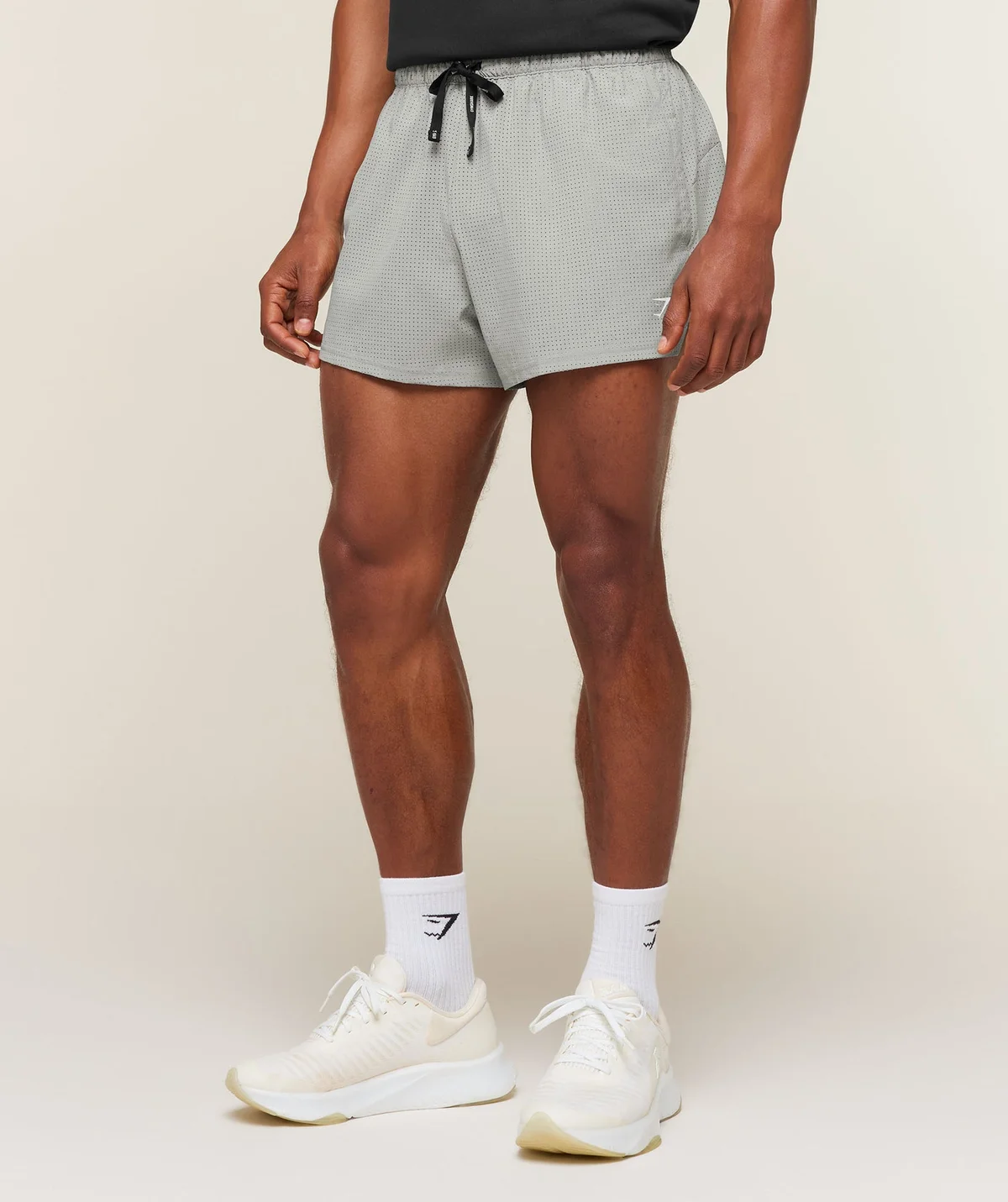 Shorts de Entrenamiento Train con Perforaciones