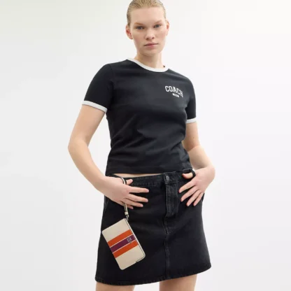 Bolso de mano con cremallera en las esquinas y raya - Imagen 2