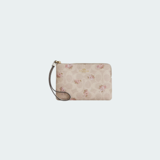 Bolso de mano con cremallera en las esquinas, de lona distintiva y estampado floral