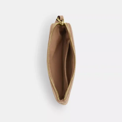 Bolso de mano con cremallera en las esquinas y lona distintiva - Imagen 3